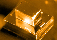 Figure 4: Integration of electronics and photonics leads to better performance in optical links but necessitates a holistic approach for co-design of the two. This figure features a 3-D–integrated CMOS-silicon photonic receiver, which employs a novel low-bandwidth trans-impedance amplifier (TIA) front-end, doublesampling, and equalization through dynamic offset modulation. Figure 4